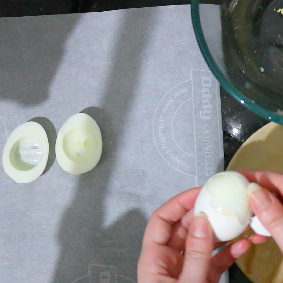 peel and cut eggs into half