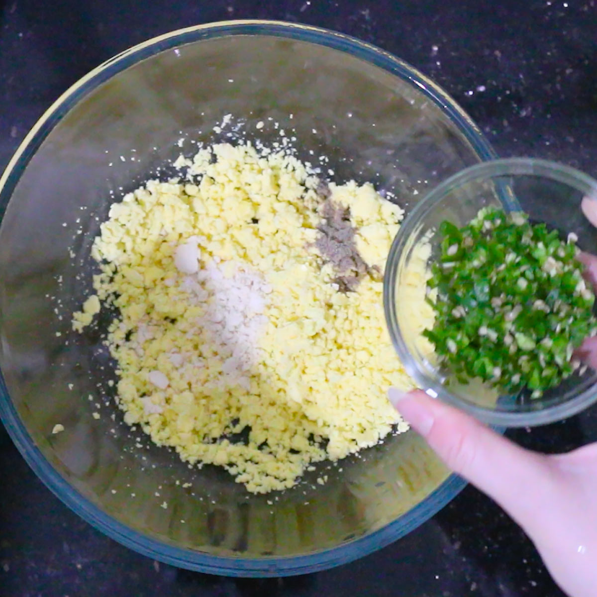 add seasoning and chopped jalapeños to yolk