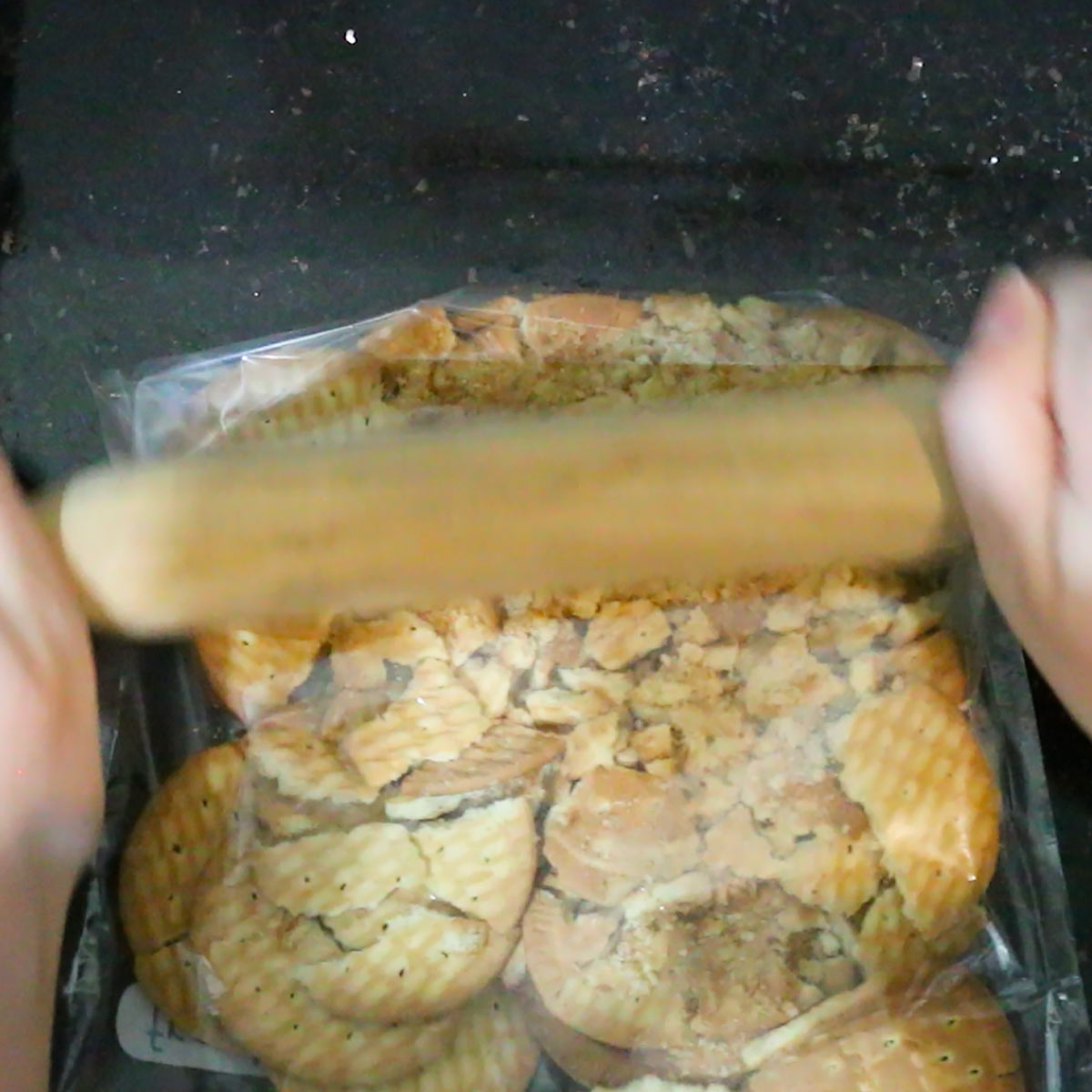 crushing cookies in a zip lock bag