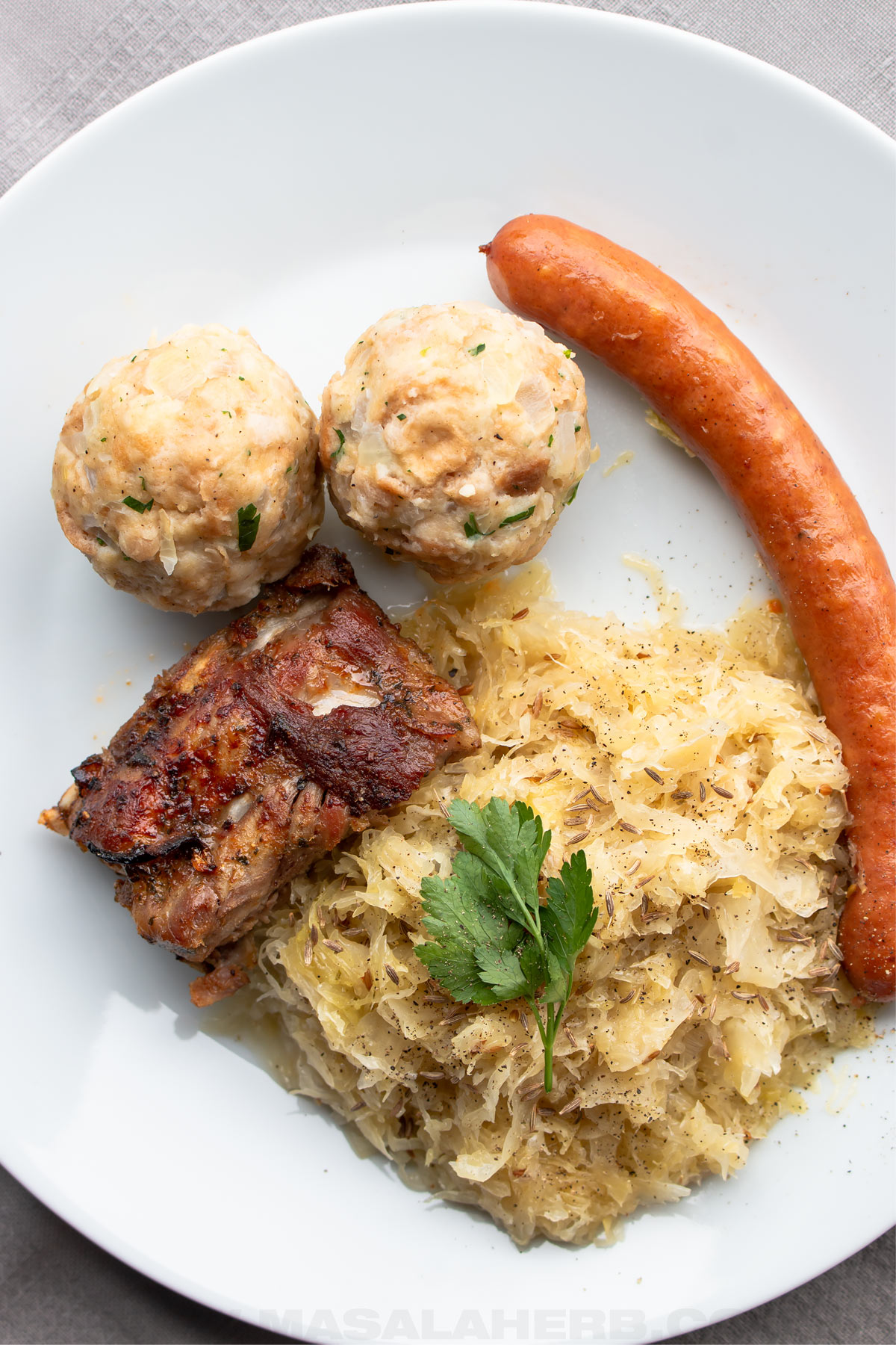 Semmelknödel plate with Sauerkraut and meat