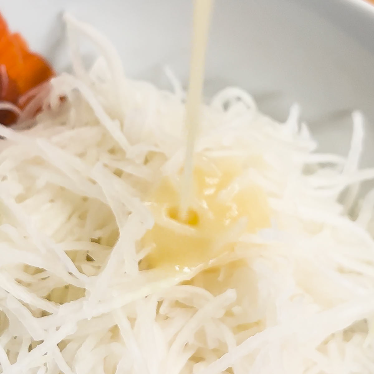 top shredded radish with dressing