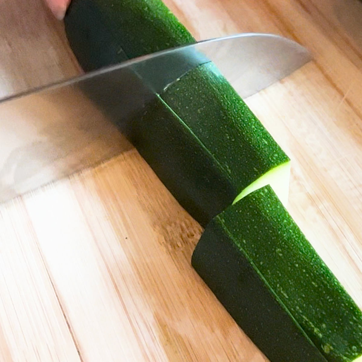 cut zucchini into thumb-sized sticks