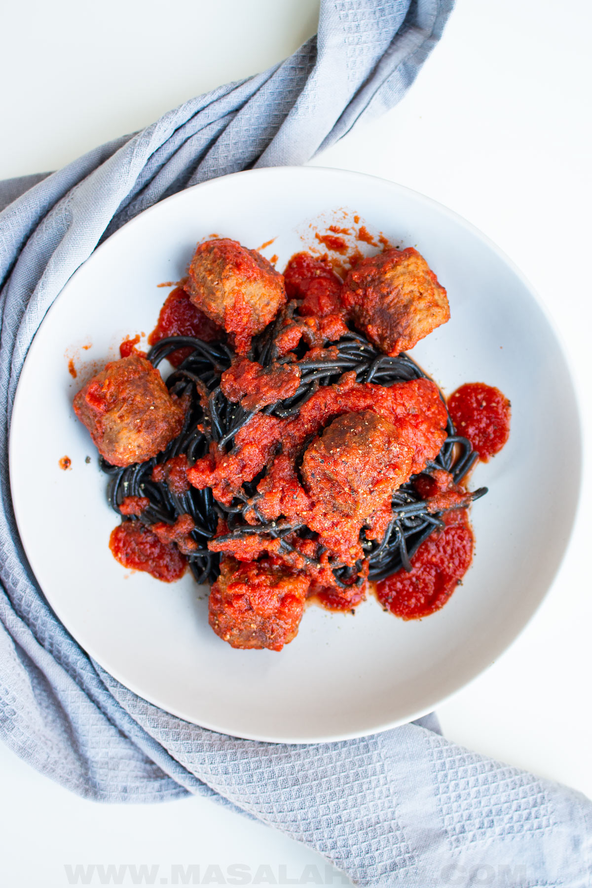 spooky meatballs with black quid ink pasta