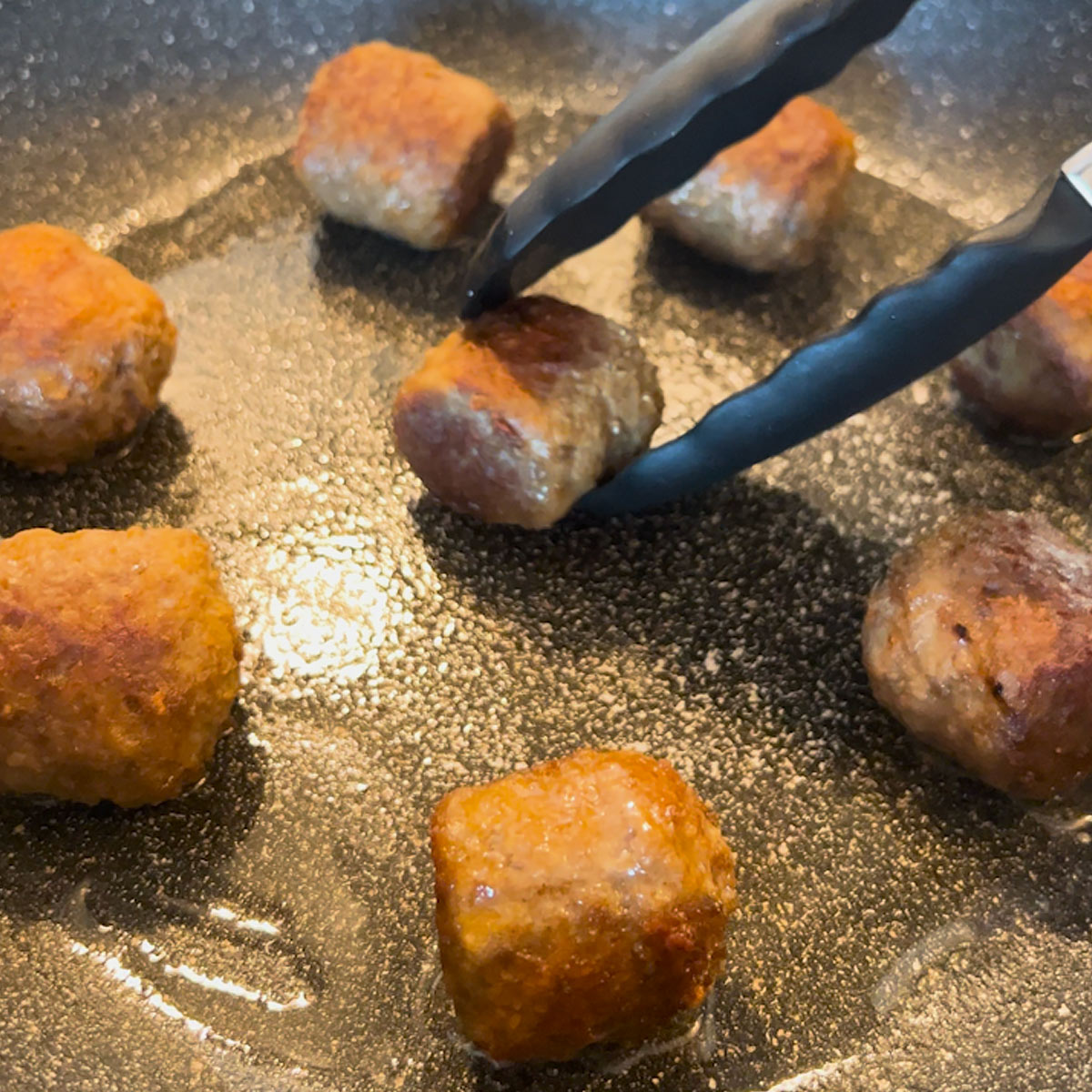 sear meatballs on all sides