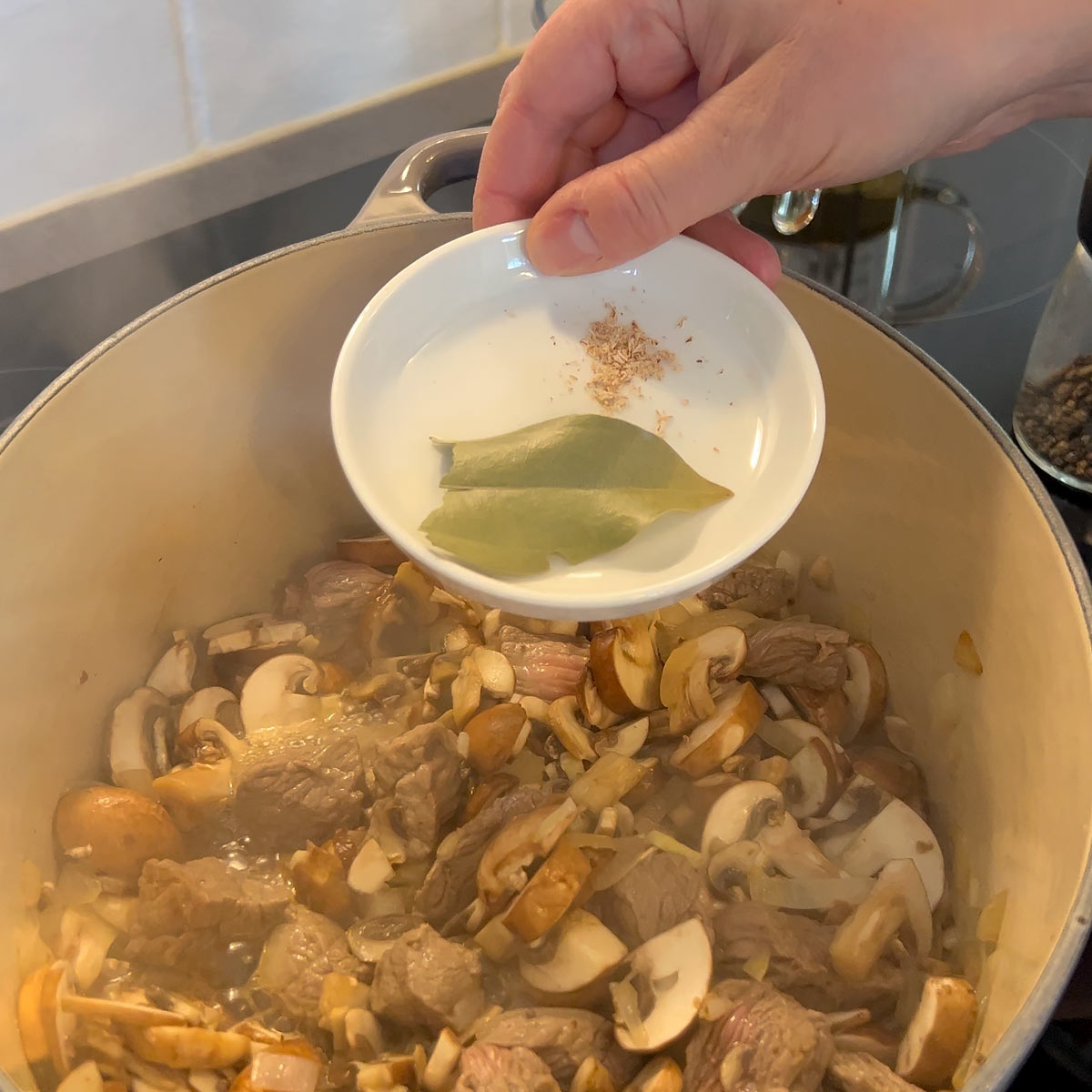 season with bay leaf and nutmeg