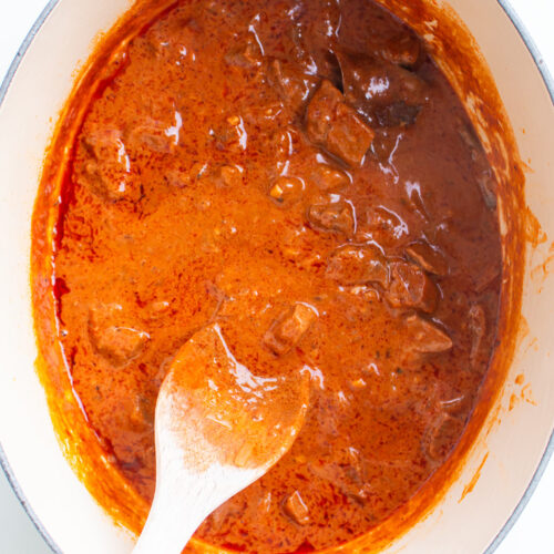 Beef cubes are slow-cooked to perfection in a sauce infused with paprika