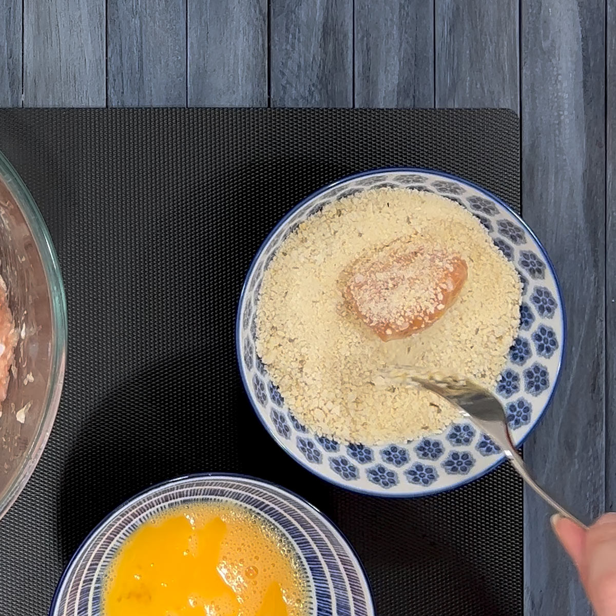 toss chicken nugget in breadcrumbs