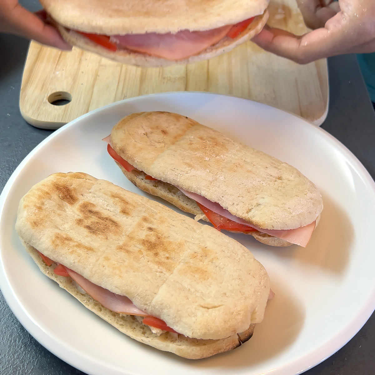 close panini bread with other bread half