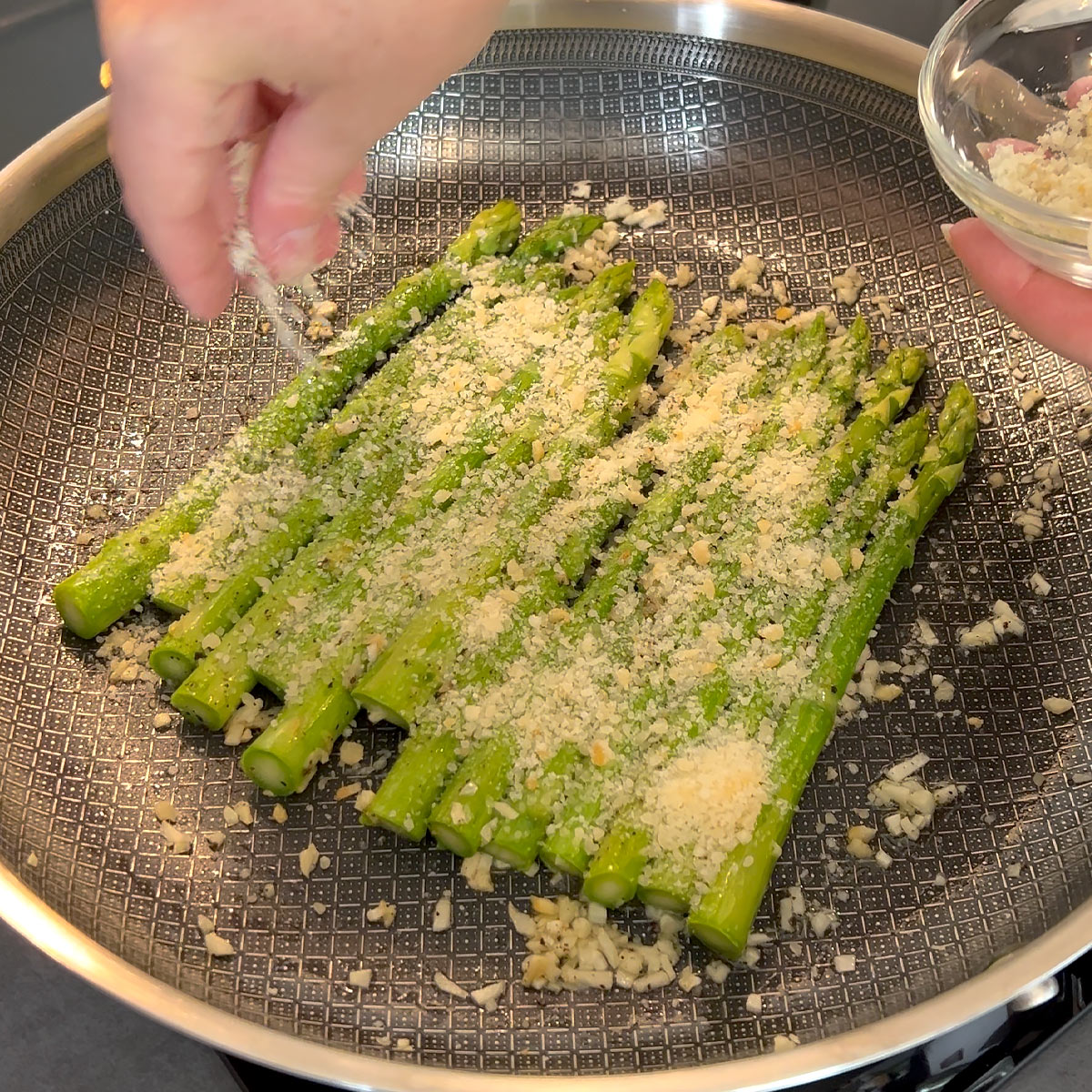 top asparagus with parmesan