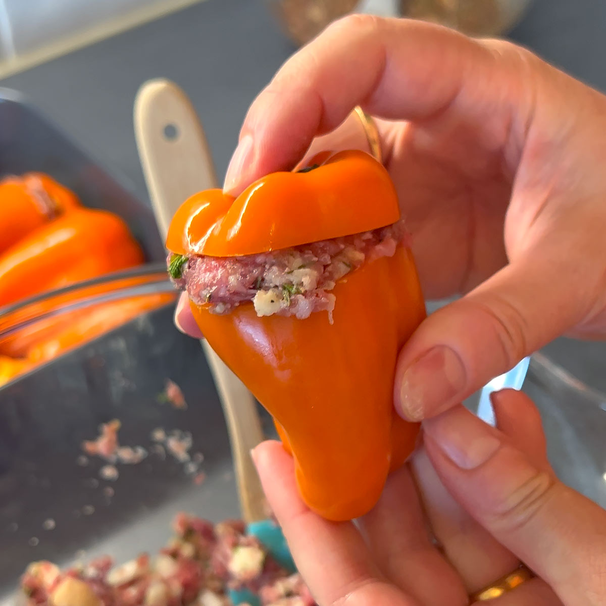 over fill peppers with the meat filling