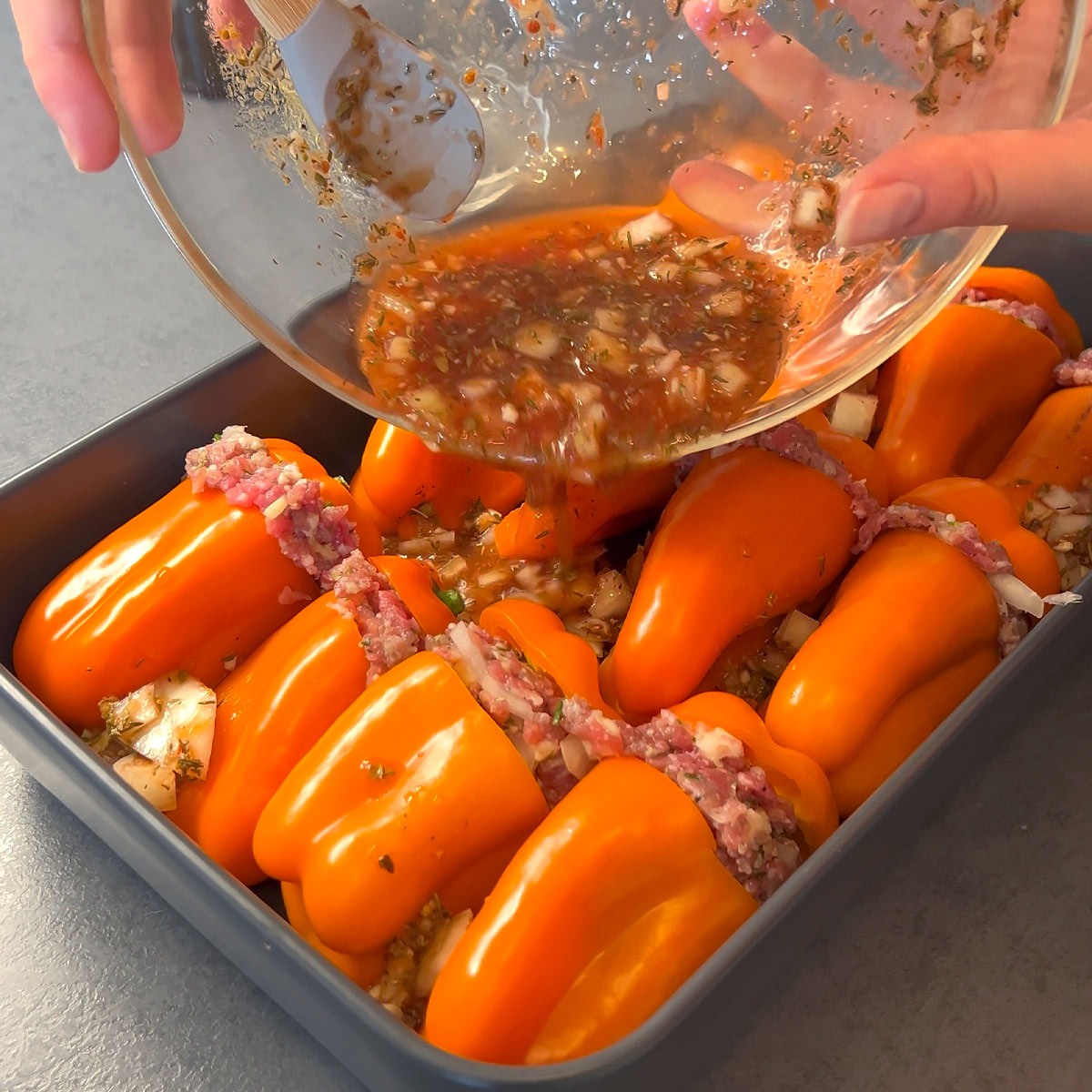 pour sauce around the peppers
