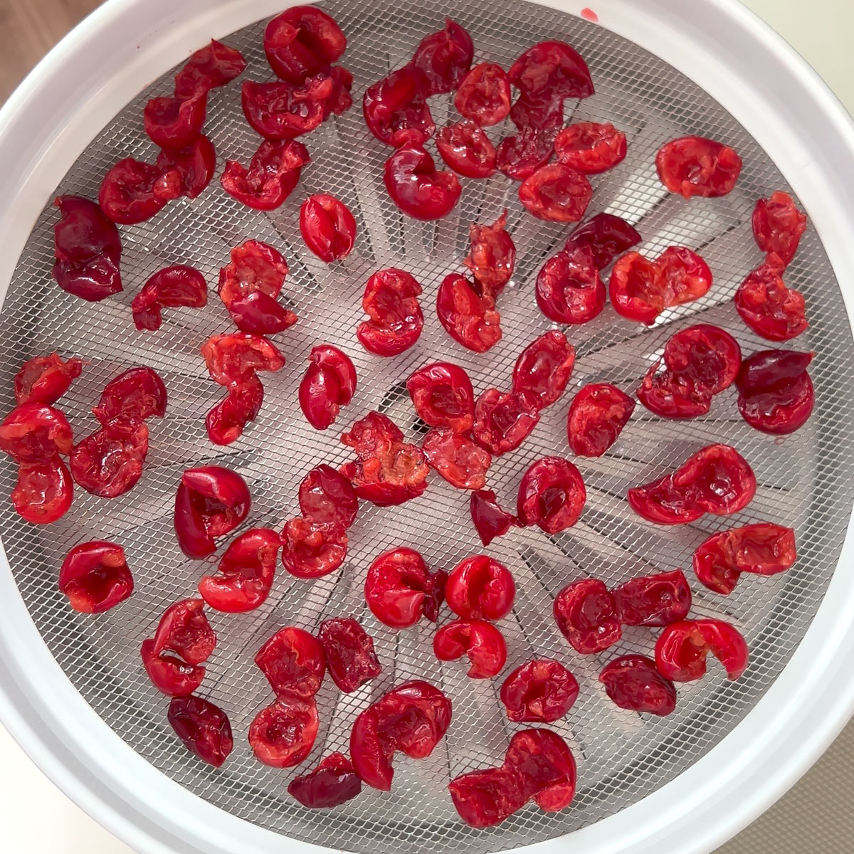 place cherries on a drying rack