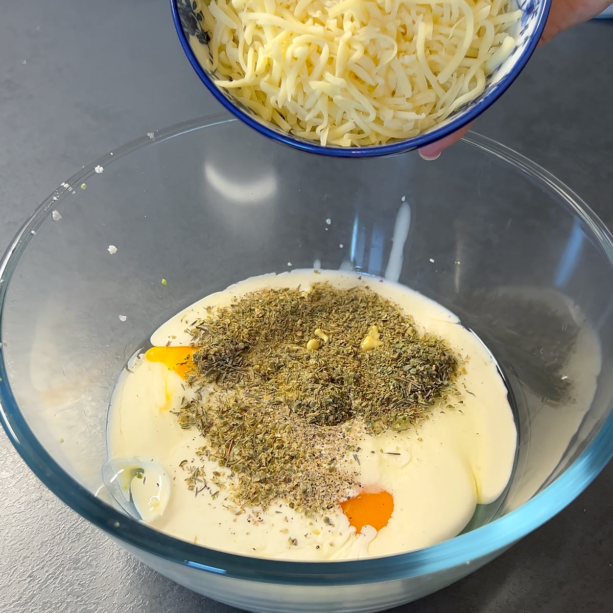 place cream, egg, seasoning and egg into a bowl