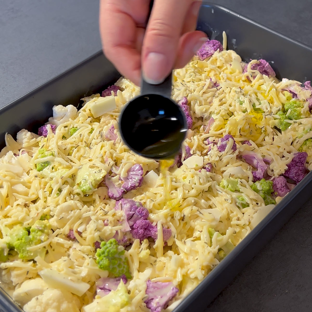drizzle olive oil over cauliflower casserole