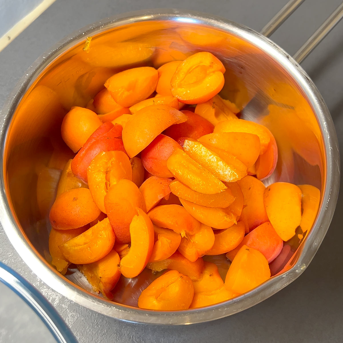 place apricots in a pan