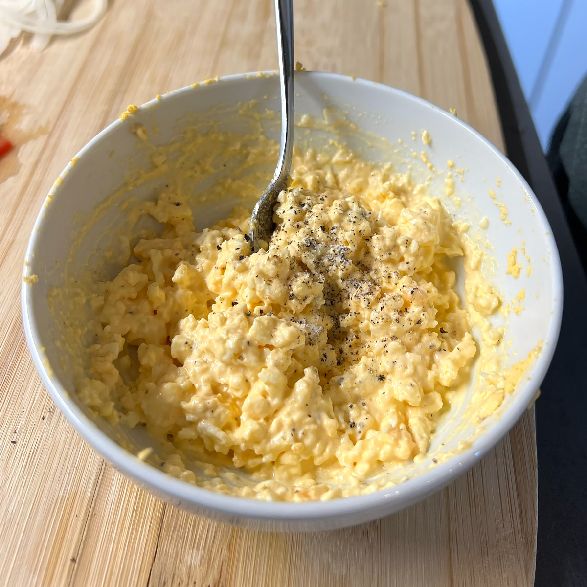 mix boiled eggs with mayonnaise, salt and pepper