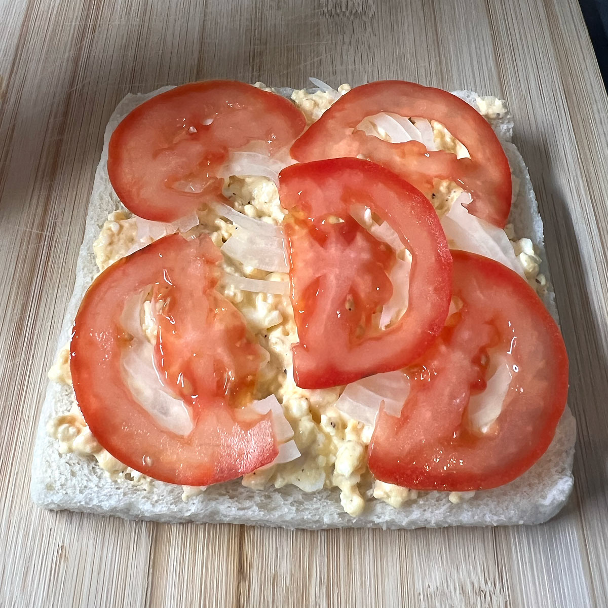 top with tomato slices