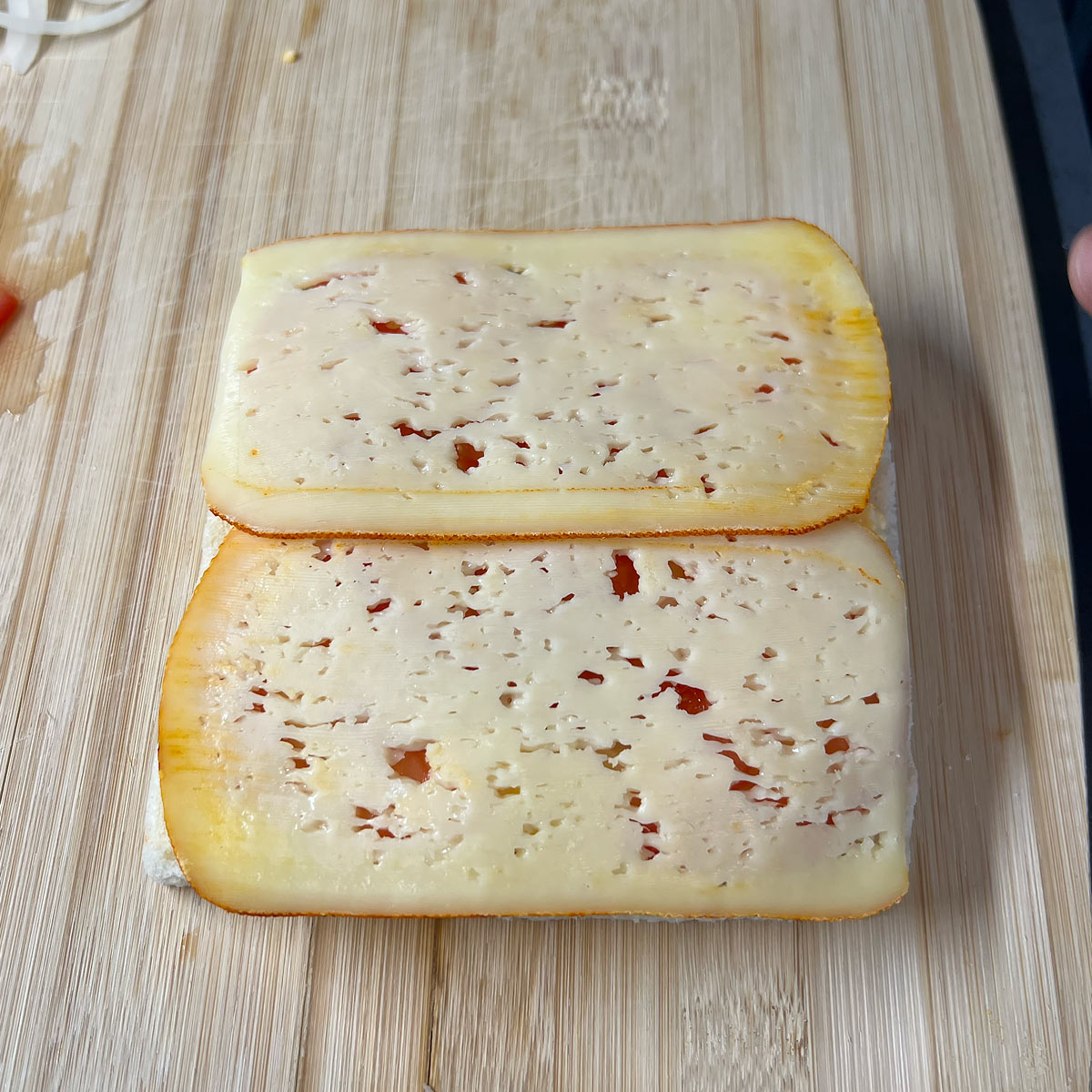 top with cheese slices