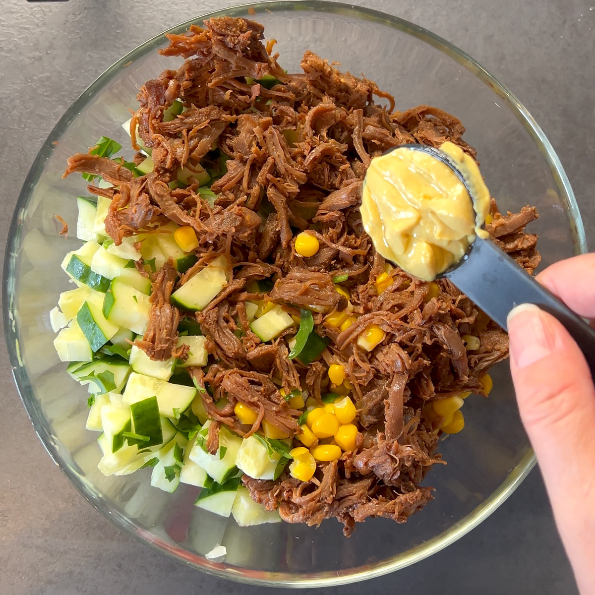 add mustard to shredded beef salad