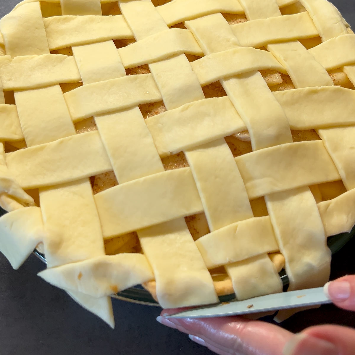 cut off any ends that are popping out and tuck in the raw pie strips