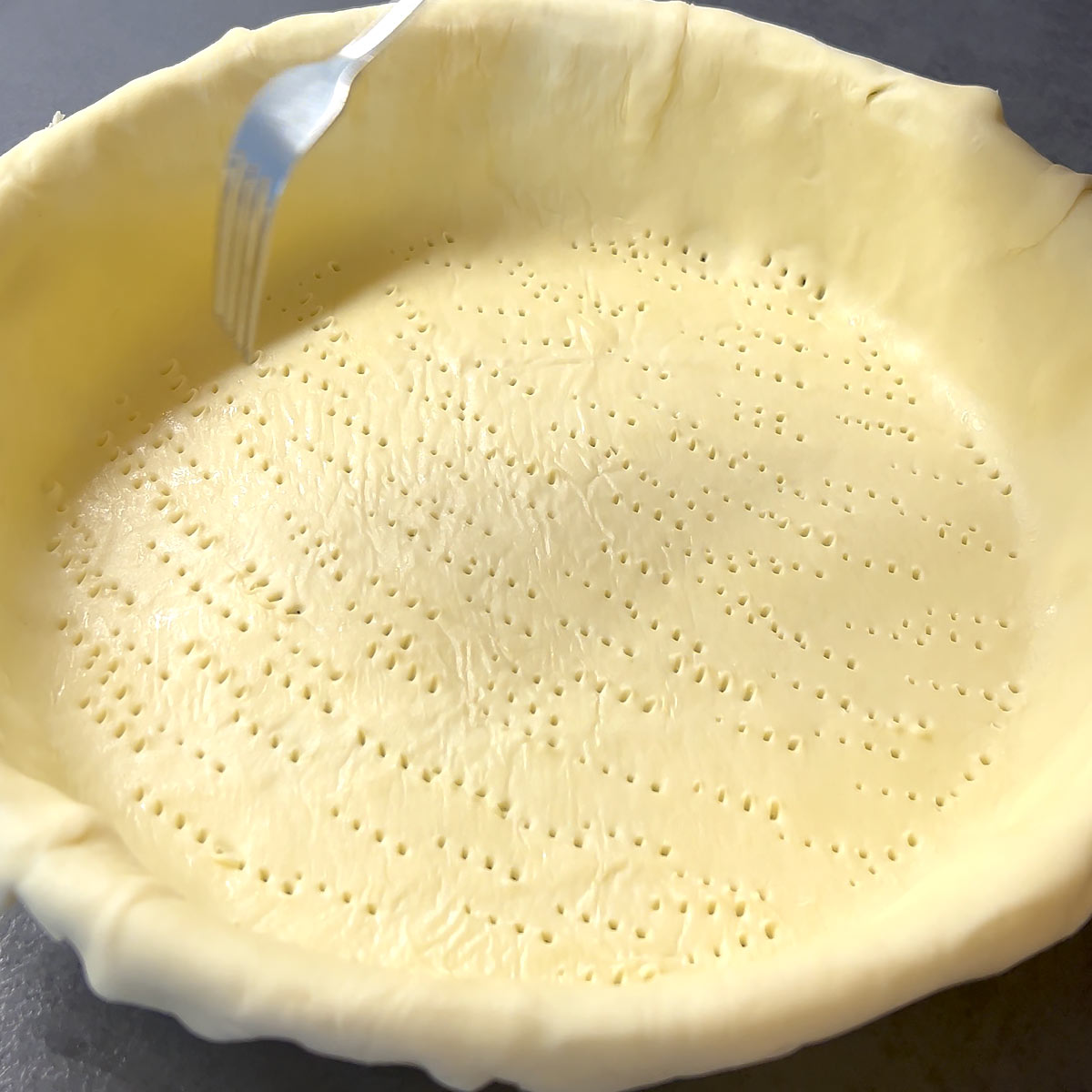 Poke with a fork into the pie dough