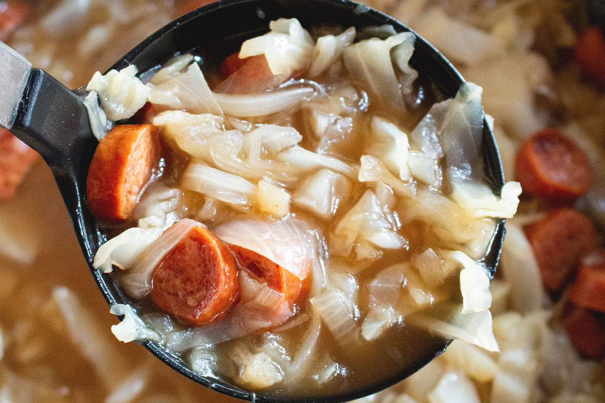 cabbage sausage soup ladle