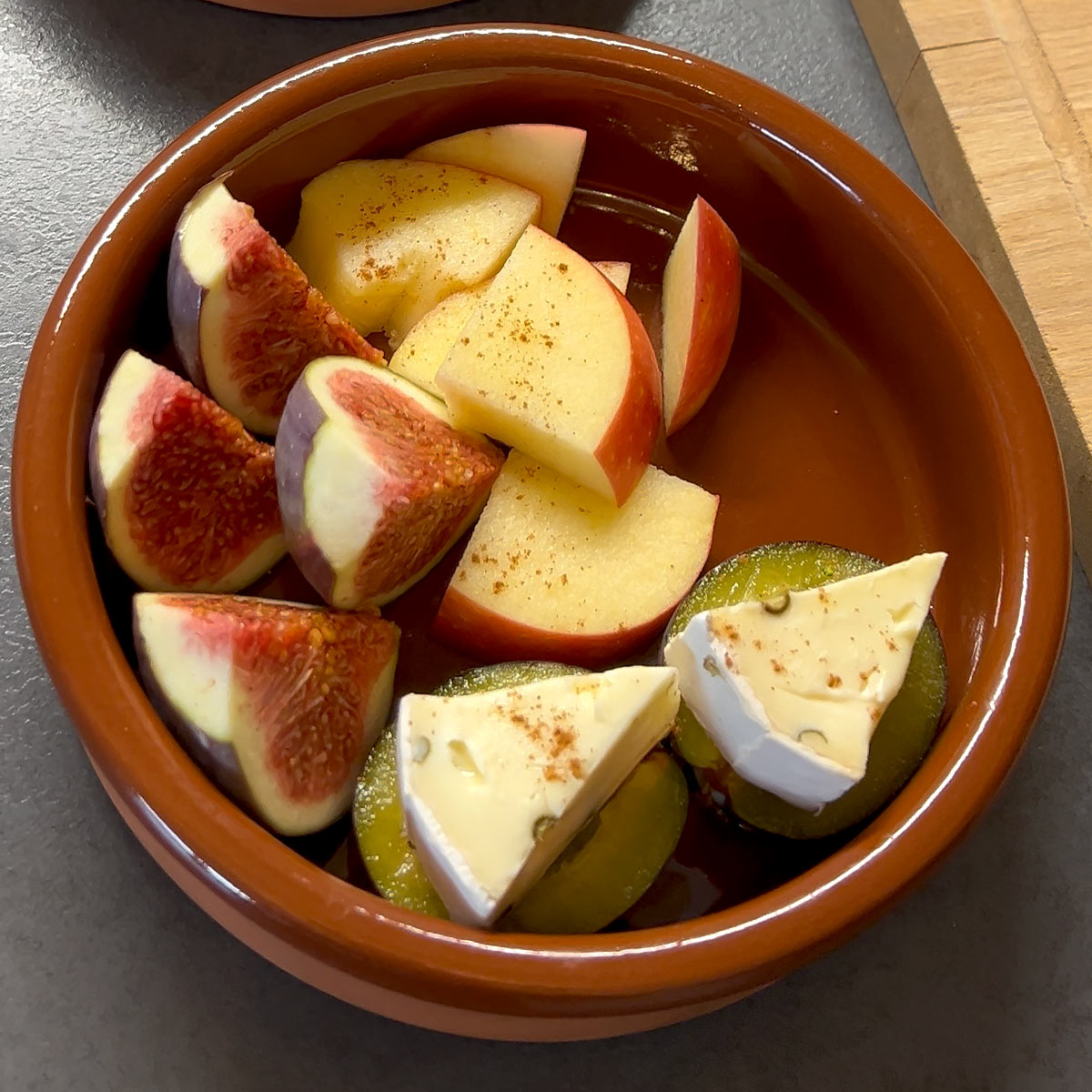 brie and fruits with cinnamon