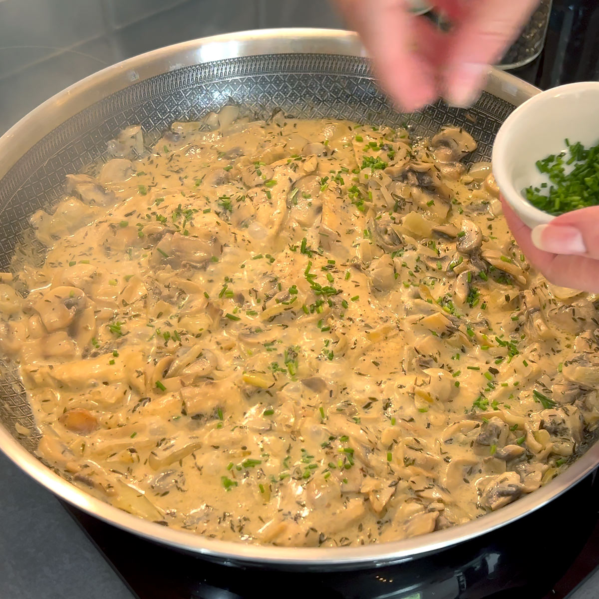 Cook down your chicken dish and season with chives
