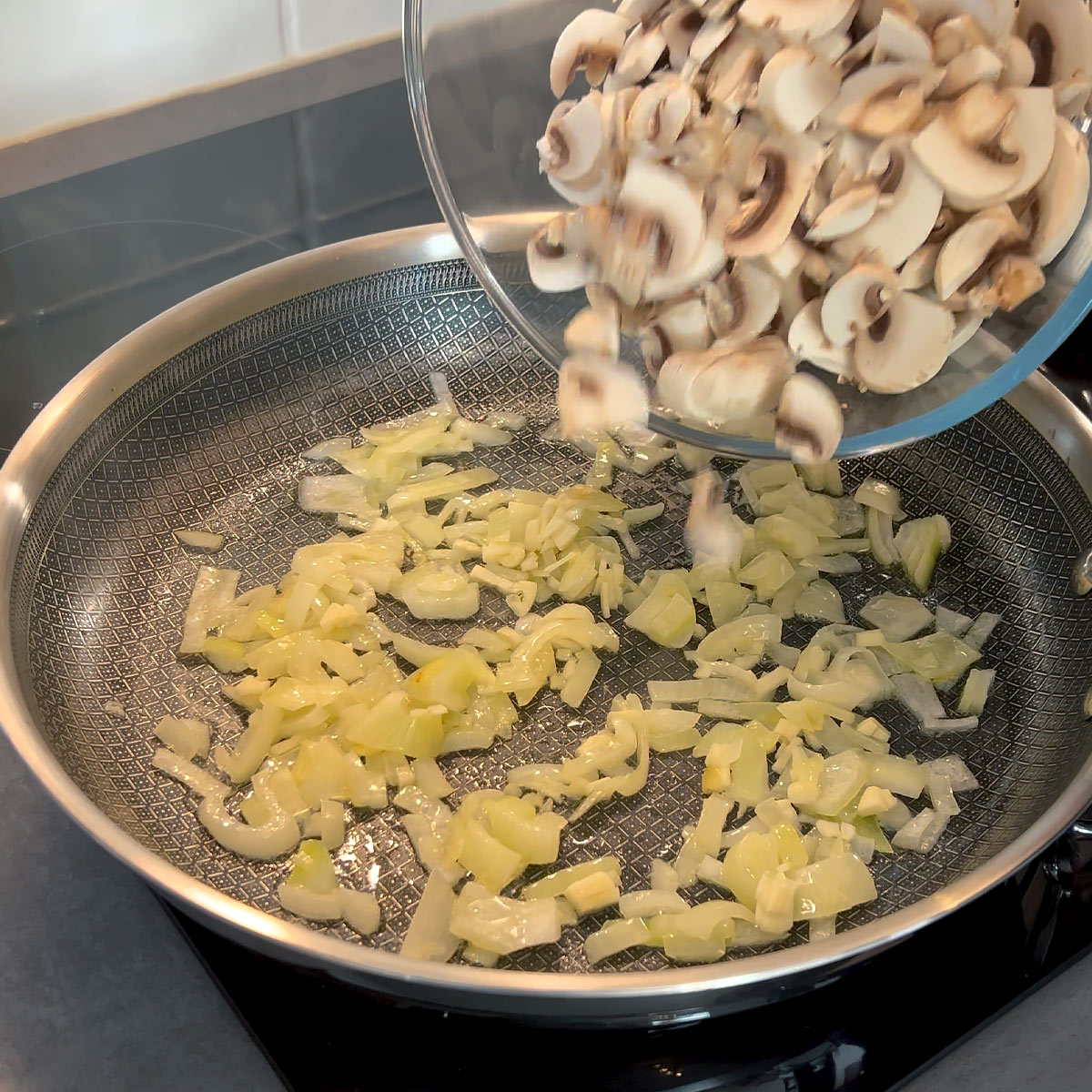 sauté onions, garlic and stir in mushroom slices
