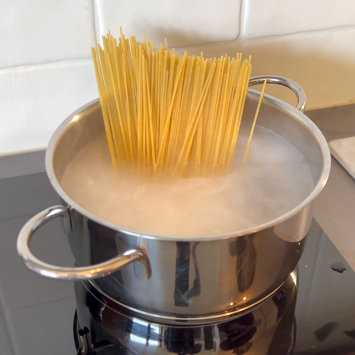 boil spaghetti in salt water