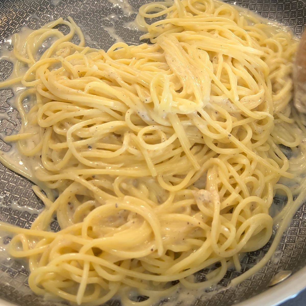 cook down cacio e pepe until done