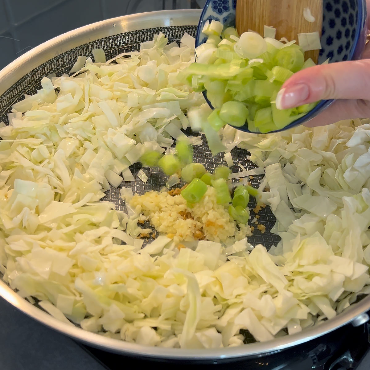 Stir in garlic, ginger and onion