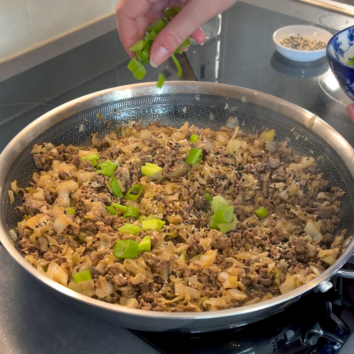 top with green onion and sesame seeds