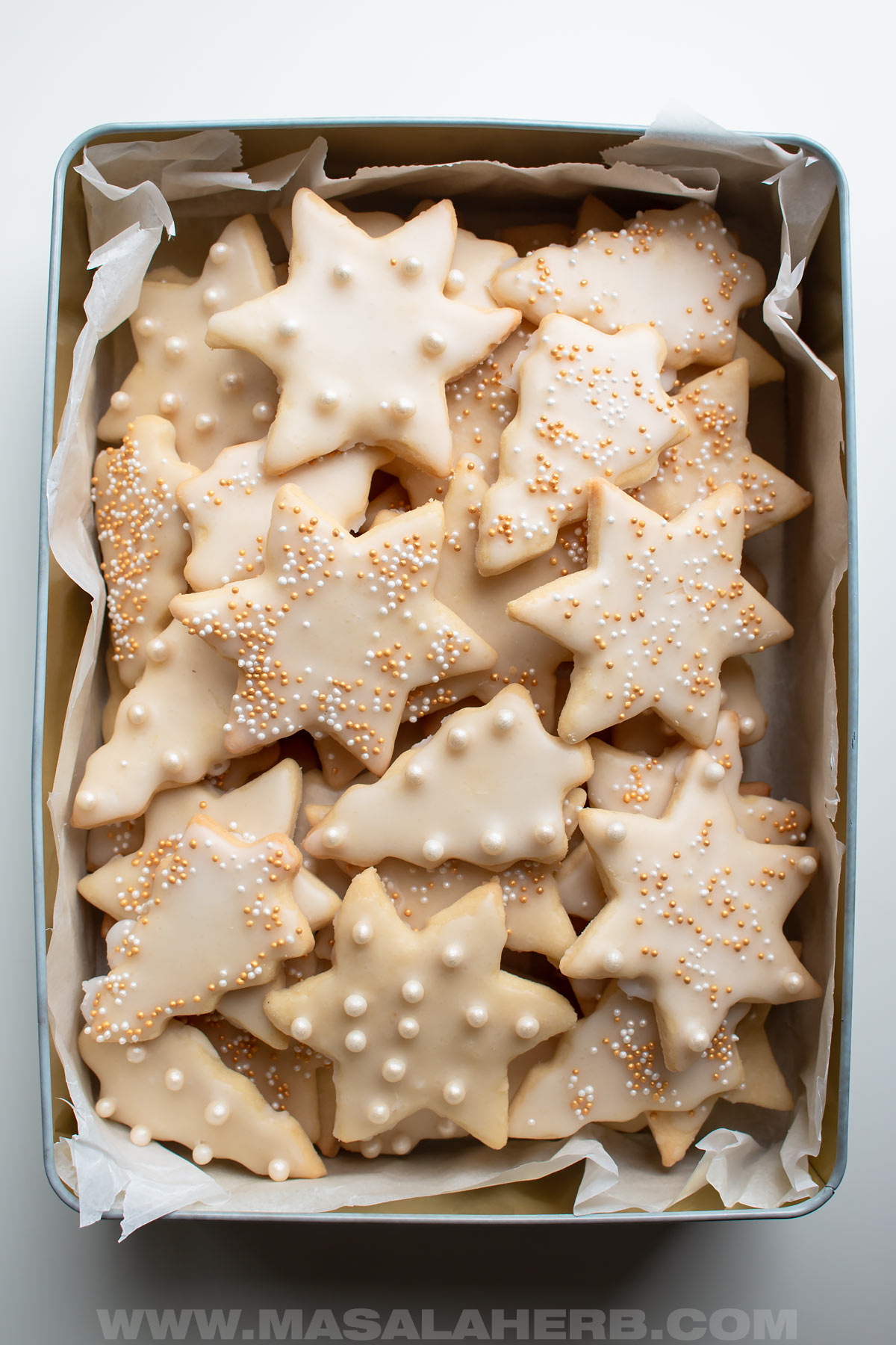 homemade sugar cookies in a tin box